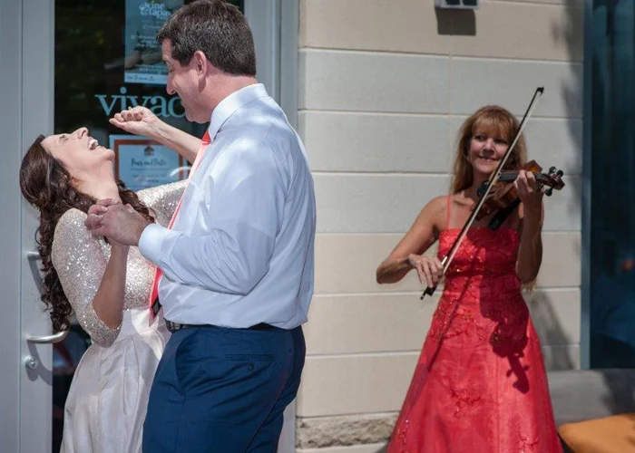 Christine Playing for happy couple
